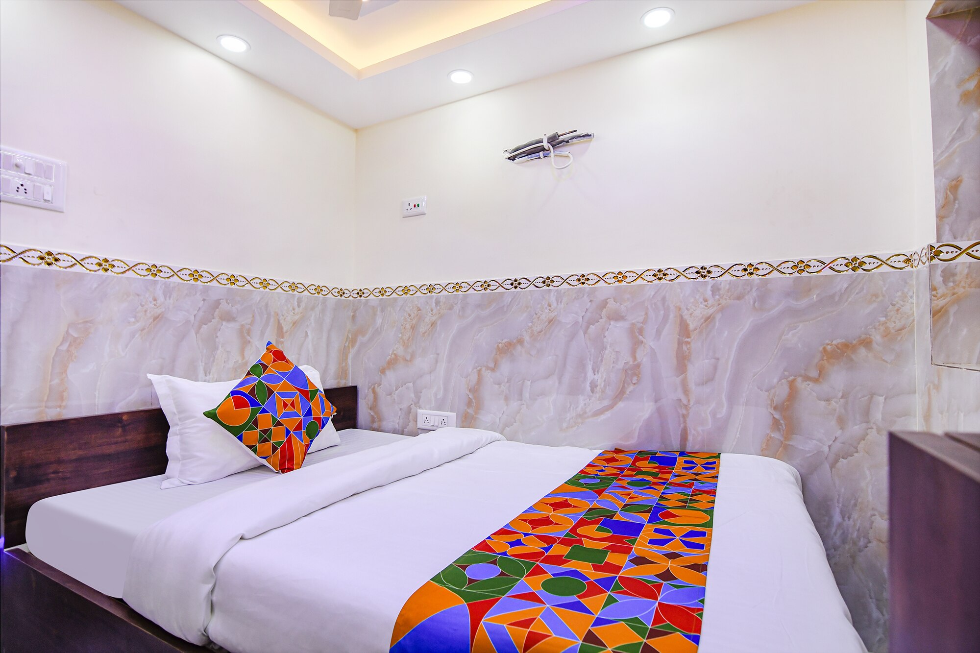 FabHotel MN International - Above milan traders near dawat e hind restaurant - Tap to explore photos