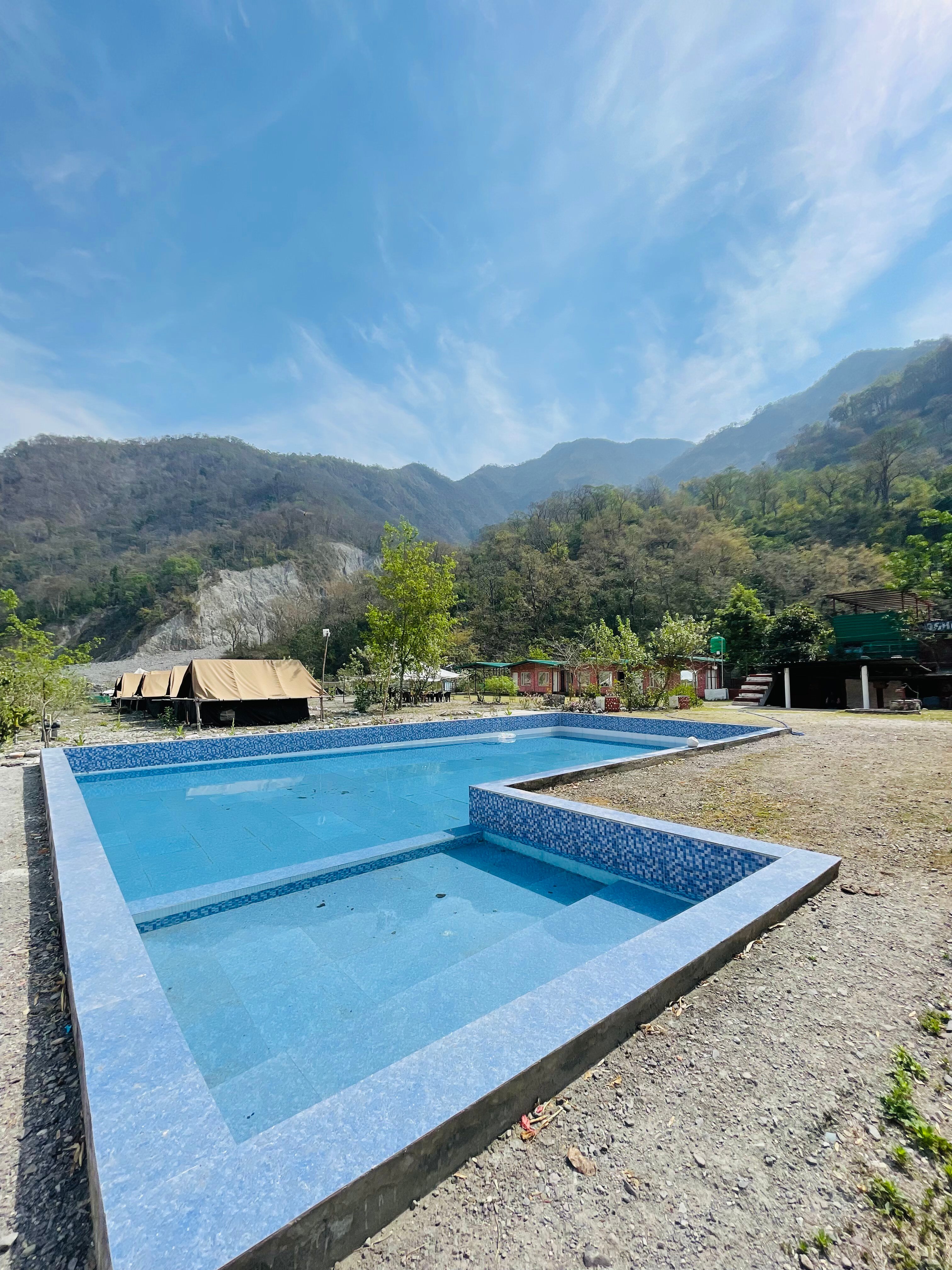 River Camp Cottages - Tap to explore photos