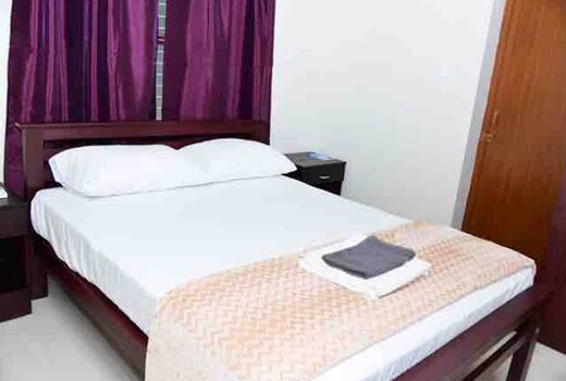 Executive Studio Apartment by Athrakkattu Enclave