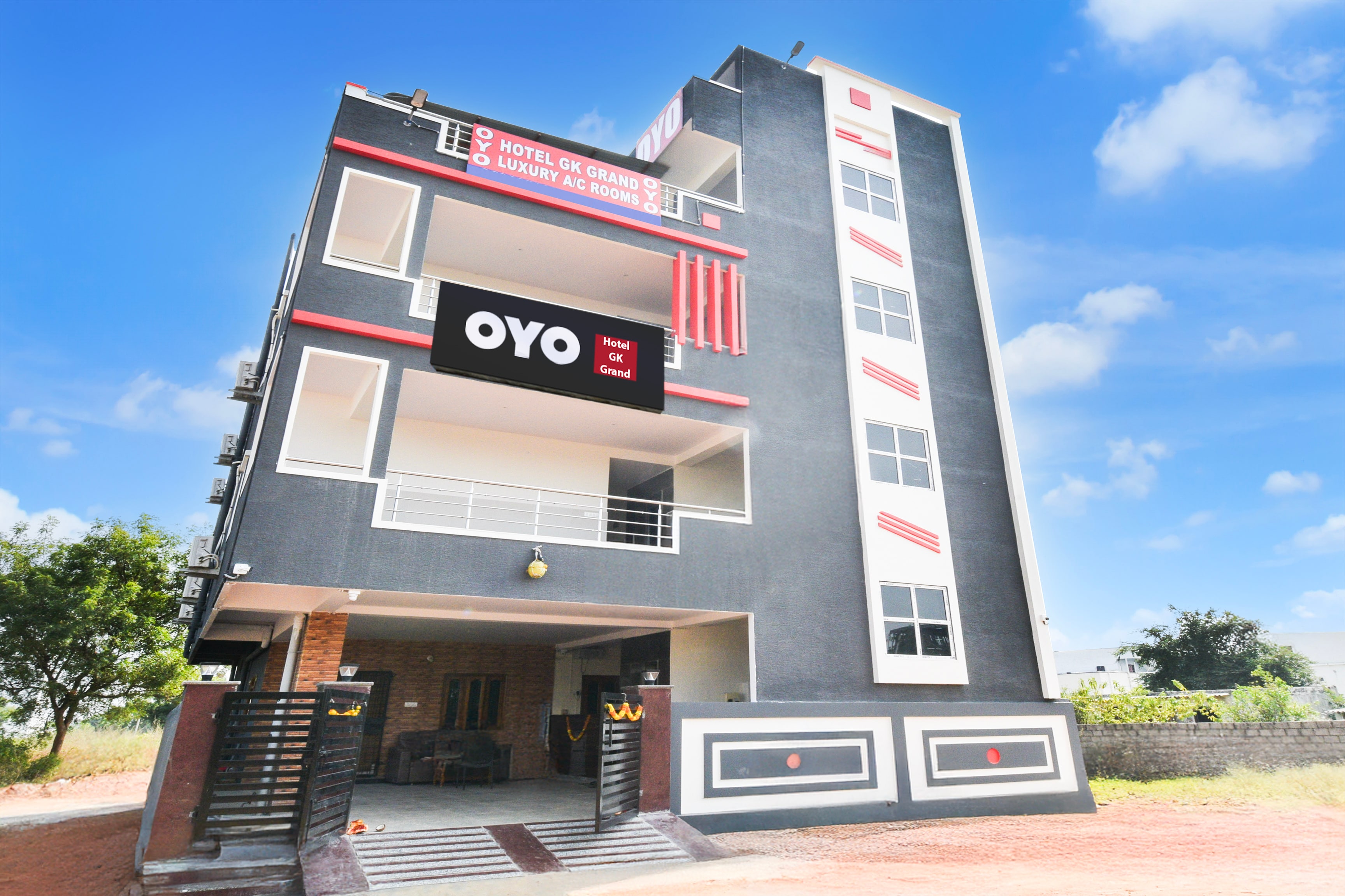 Hotel O GK Grand - Tap to explore photos