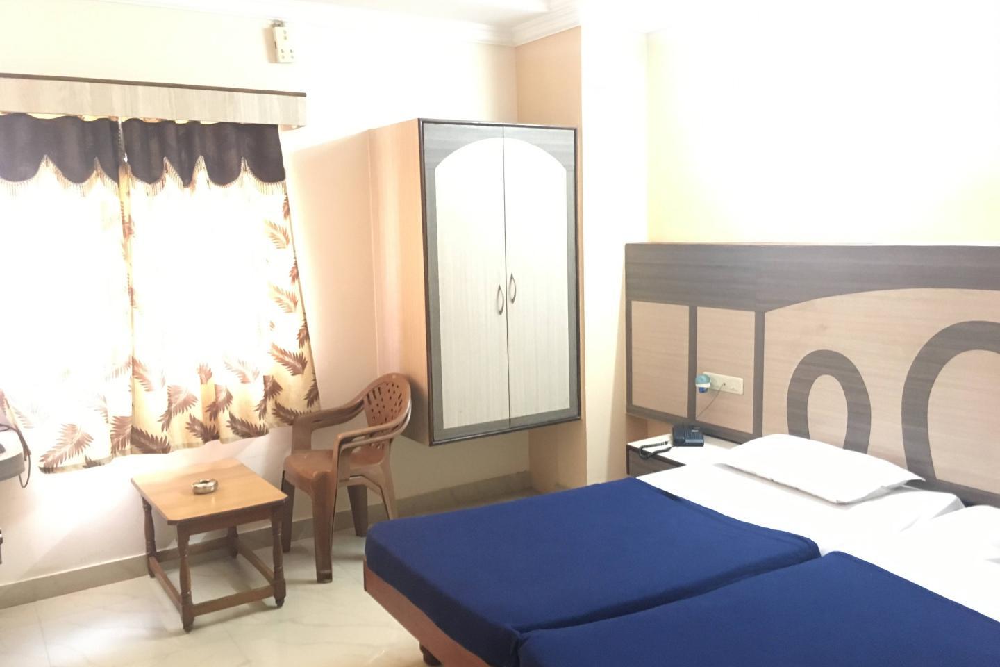 i-ROOMZ Amrutha Residency - Tap to explore photos
