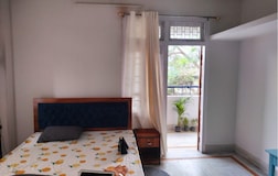 AC Bedroom 2 with a balcony