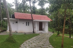 White Lotus Private tiny home, Kannur