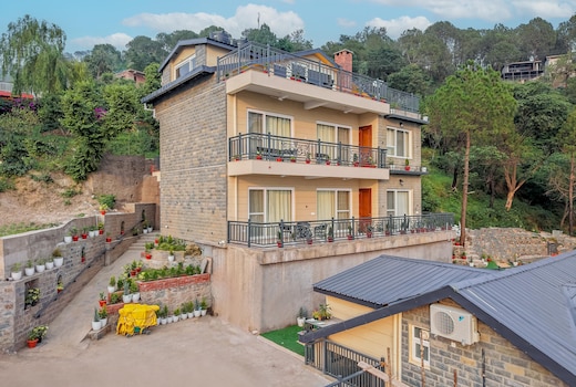 Elivaas Konifer Greyvine | Hillside 9-BHK Retreat with Attic, Scenic Views, Garden & Outdoor Seating