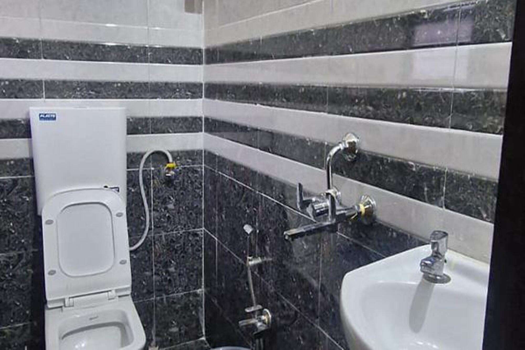 FabHotel Shree Sai Inn - Tap to explore photos