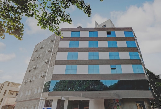 Capital O Elite Stay Jp Nagar Near SRI SATHYA GANAPATHI SHIRDI SAIBABA Temple