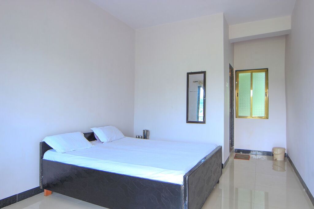 Nisarg guest house - Tap to explore photos