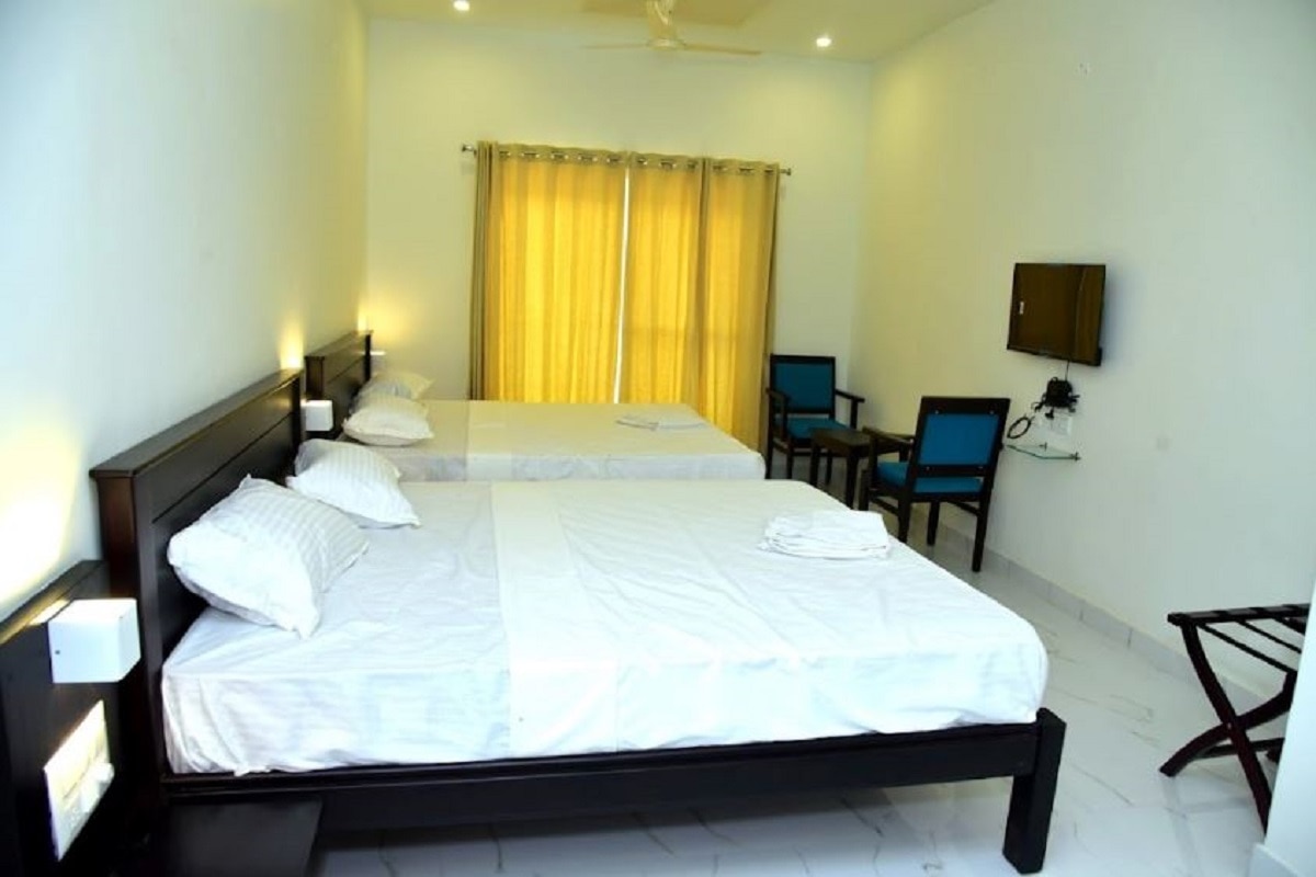 Hotel Sharada Inn - Tap to explore photos