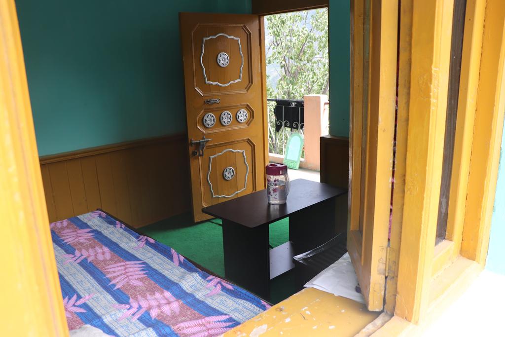 Maa Bhagwati Homestay | Rooms & Kitchen - Tap to explore photos