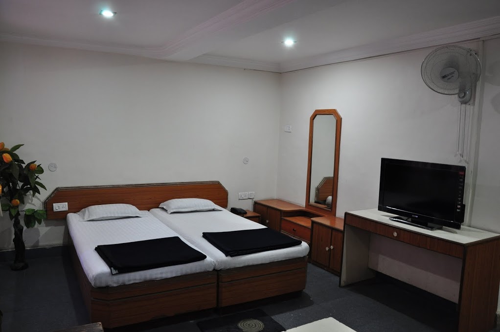 Hotel Megha City - Tap to explore photos