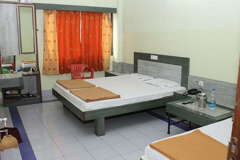 Cozy Hotel Anand - Tap to explore photos
