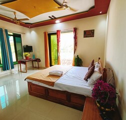 AC Room with Balcony and Garden View