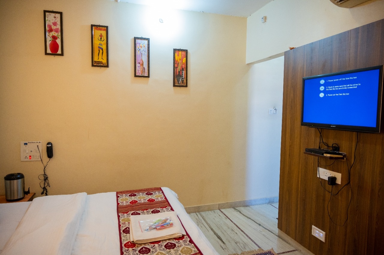 Hotel Tulsi Inn - Tap to explore photos