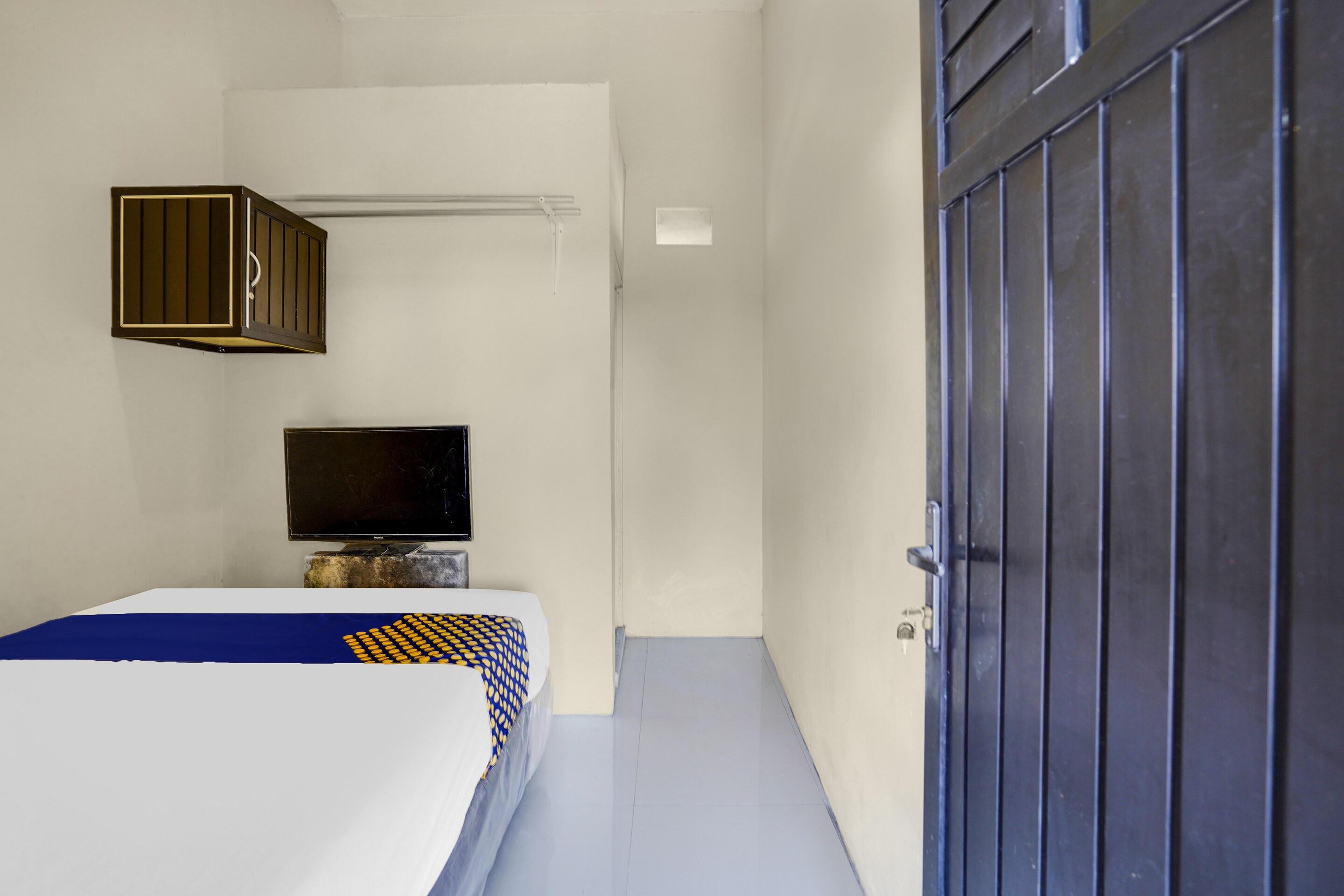 SPOT ON 91883 Kost 2 Putra Syariah - Tap to explore photos