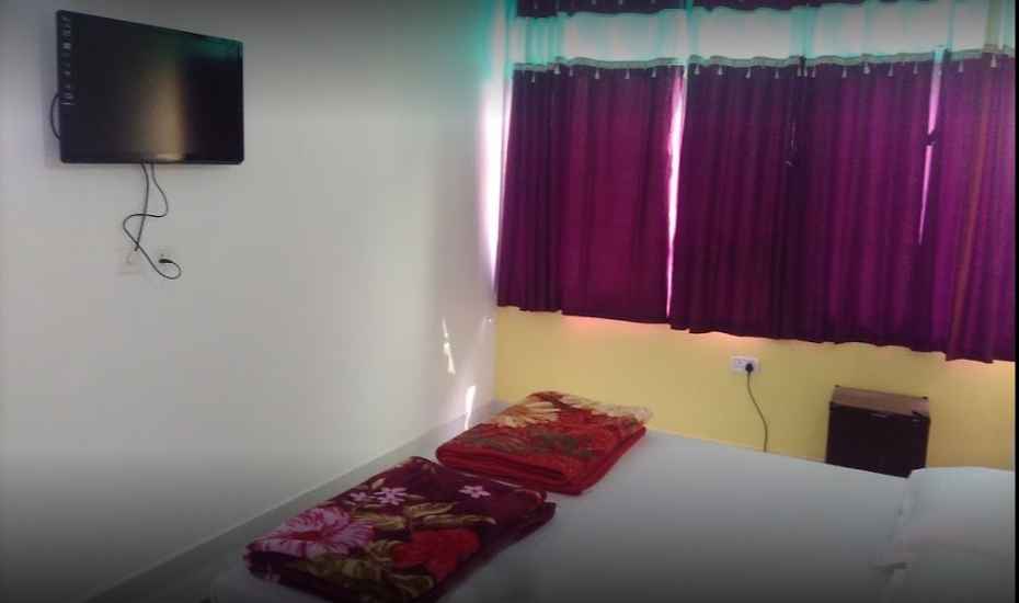 HARIOM SAI GUEST HOUSE - Tap to explore photos