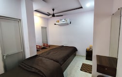 Bedroom 404 ( AC Room With Double Bed + Single Bed )
