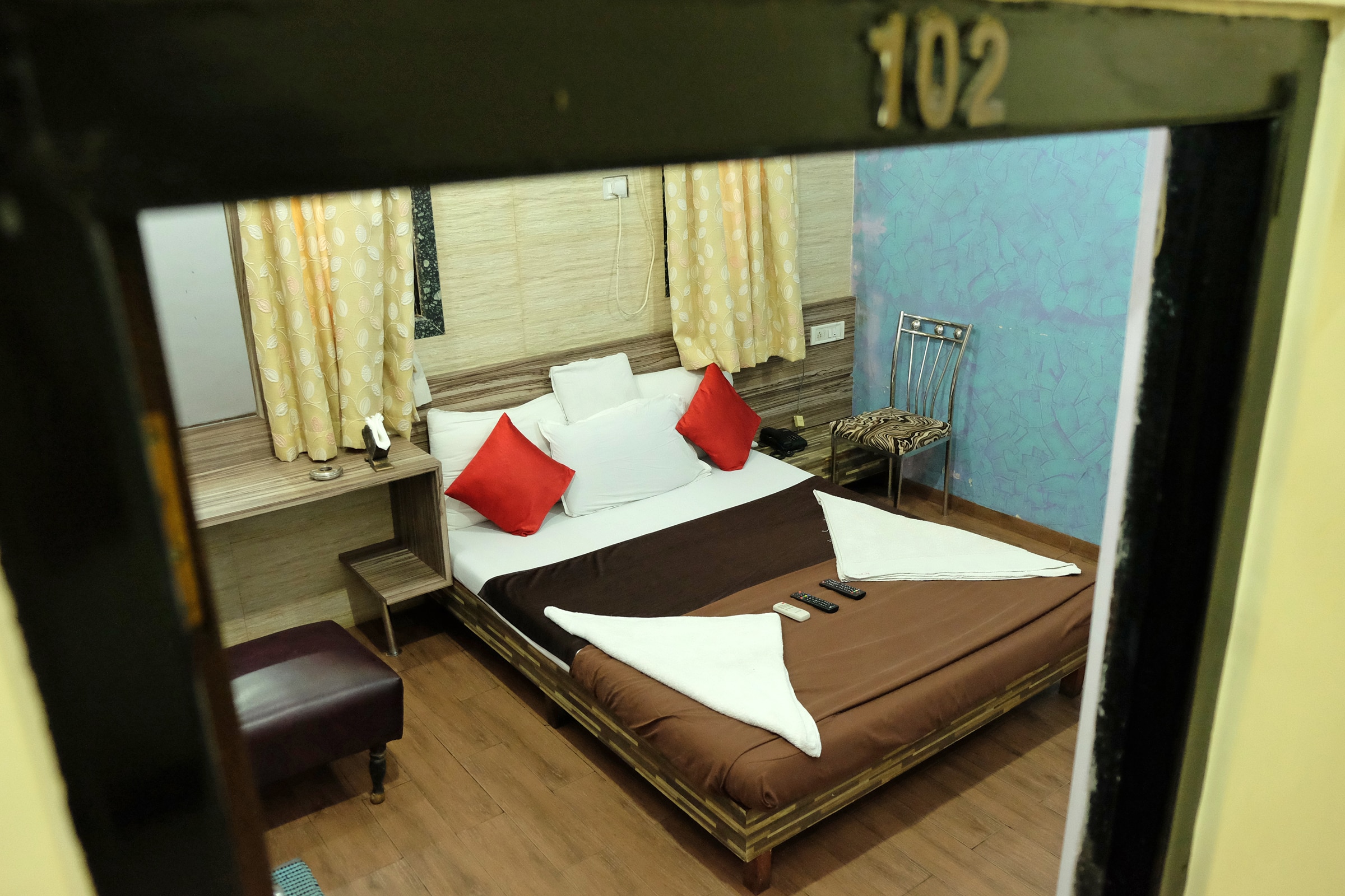 Hotel New India - Tap to explore photos