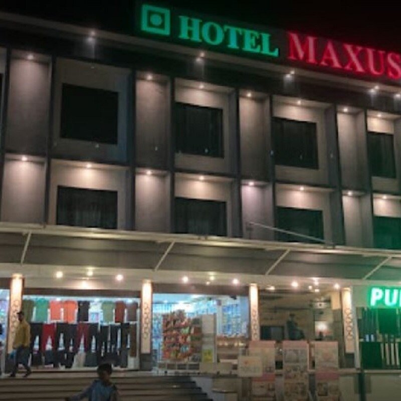 Maxus Hotel - Tap to explore photos