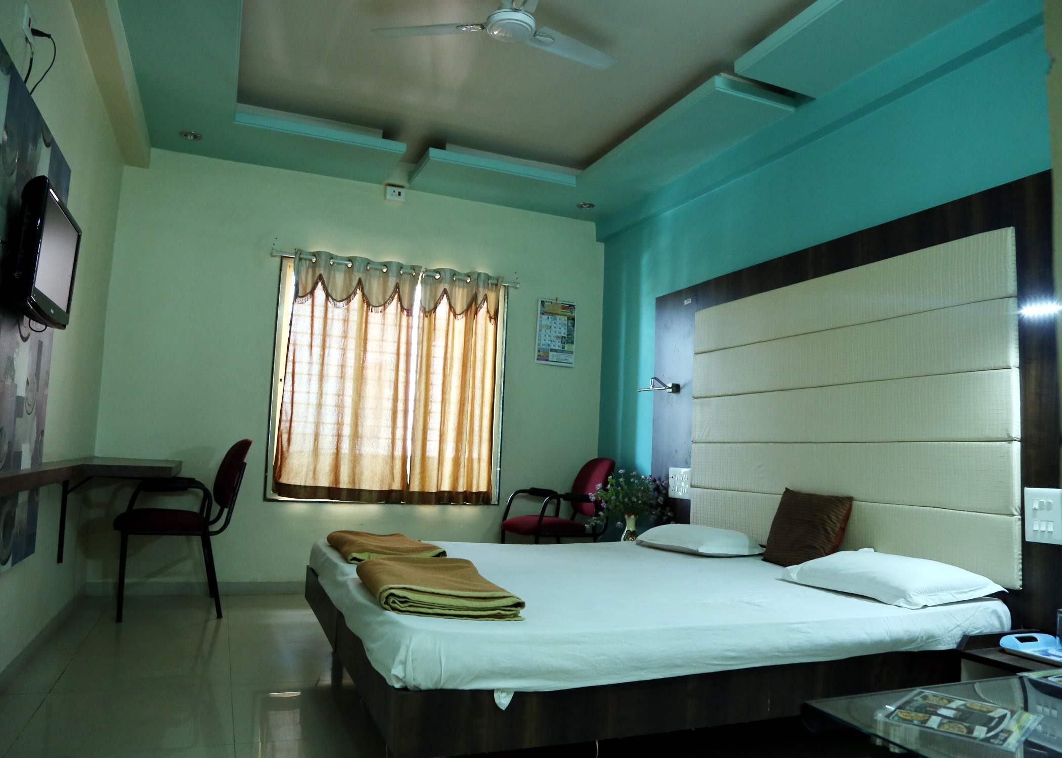 Hotel Pooja Residency - Tap to explore photos