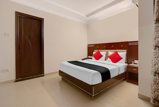 Capital O Elegant Amethyst Business Hotel Near Ragigudda Sri Prasanna Anjaneyaswamy Temple