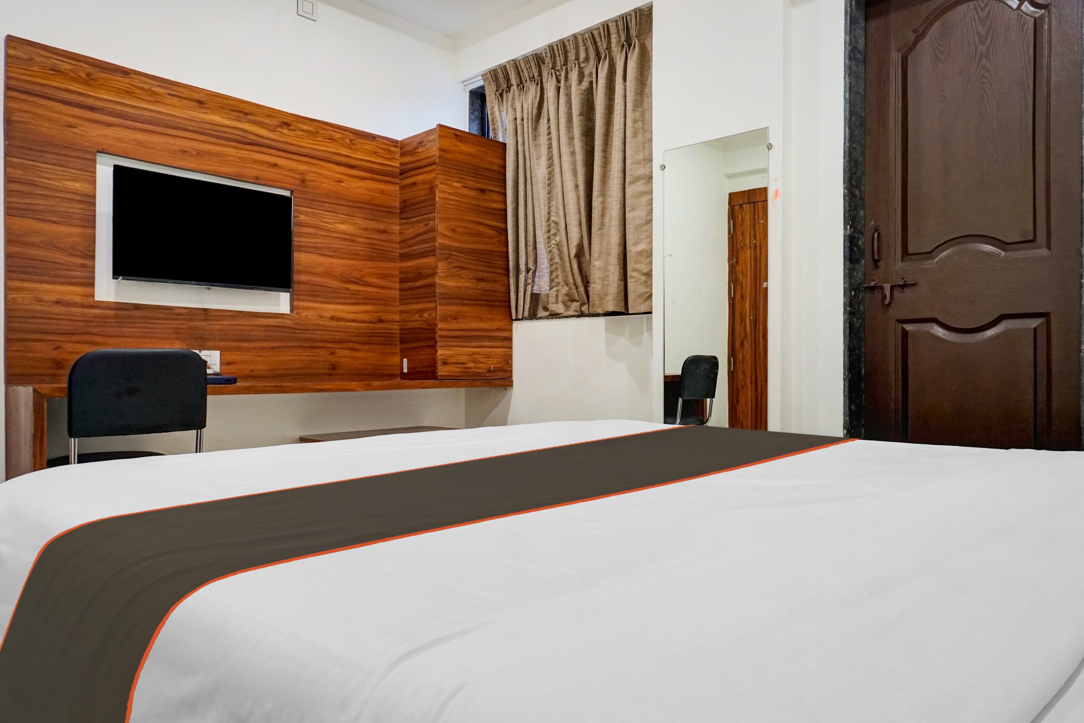 Hotel O Sathvik Executive - Tap to explore photos