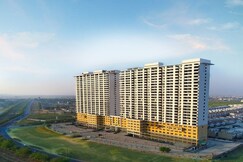 Flat in Greater Noida  
Premium Stay Paramount, Greater Noida