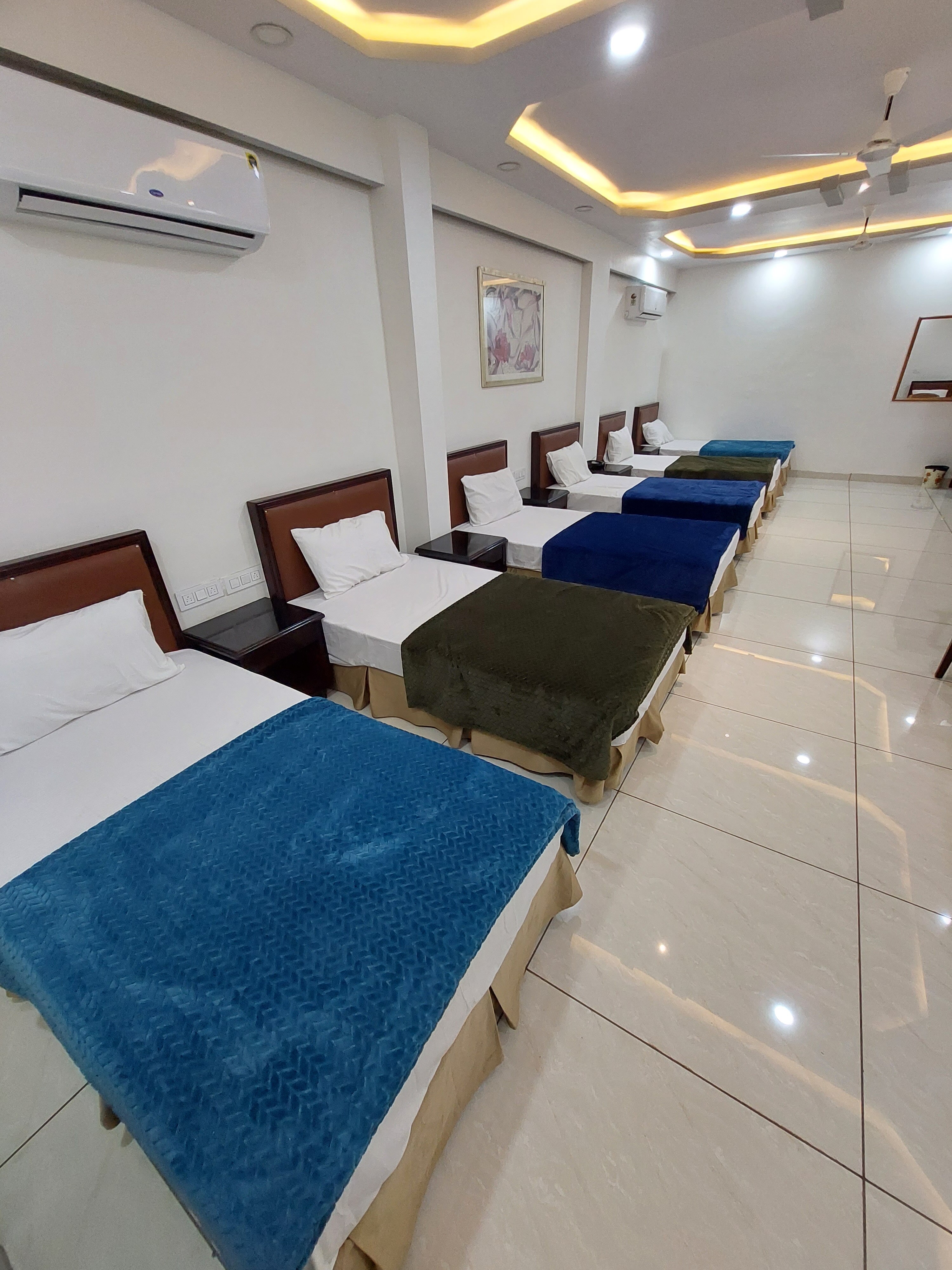 Hotel Dhruva Deluxe Rooms - Tap to explore photos