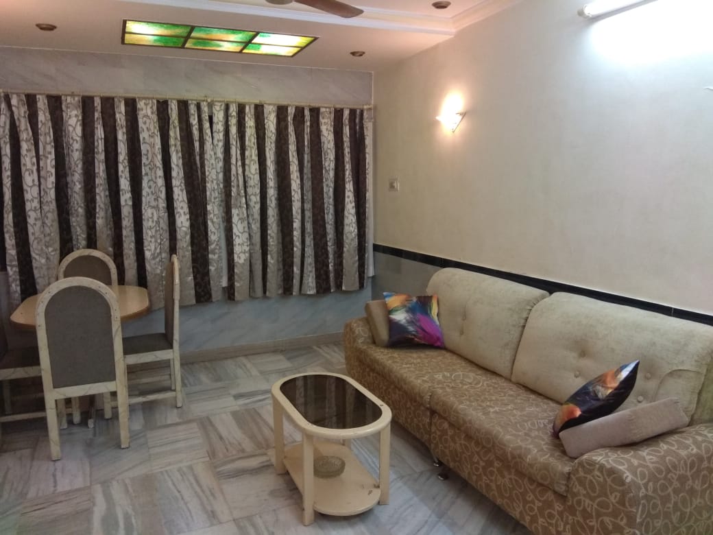 Navin Mohan 1bhk apartment - Tap to explore photos
