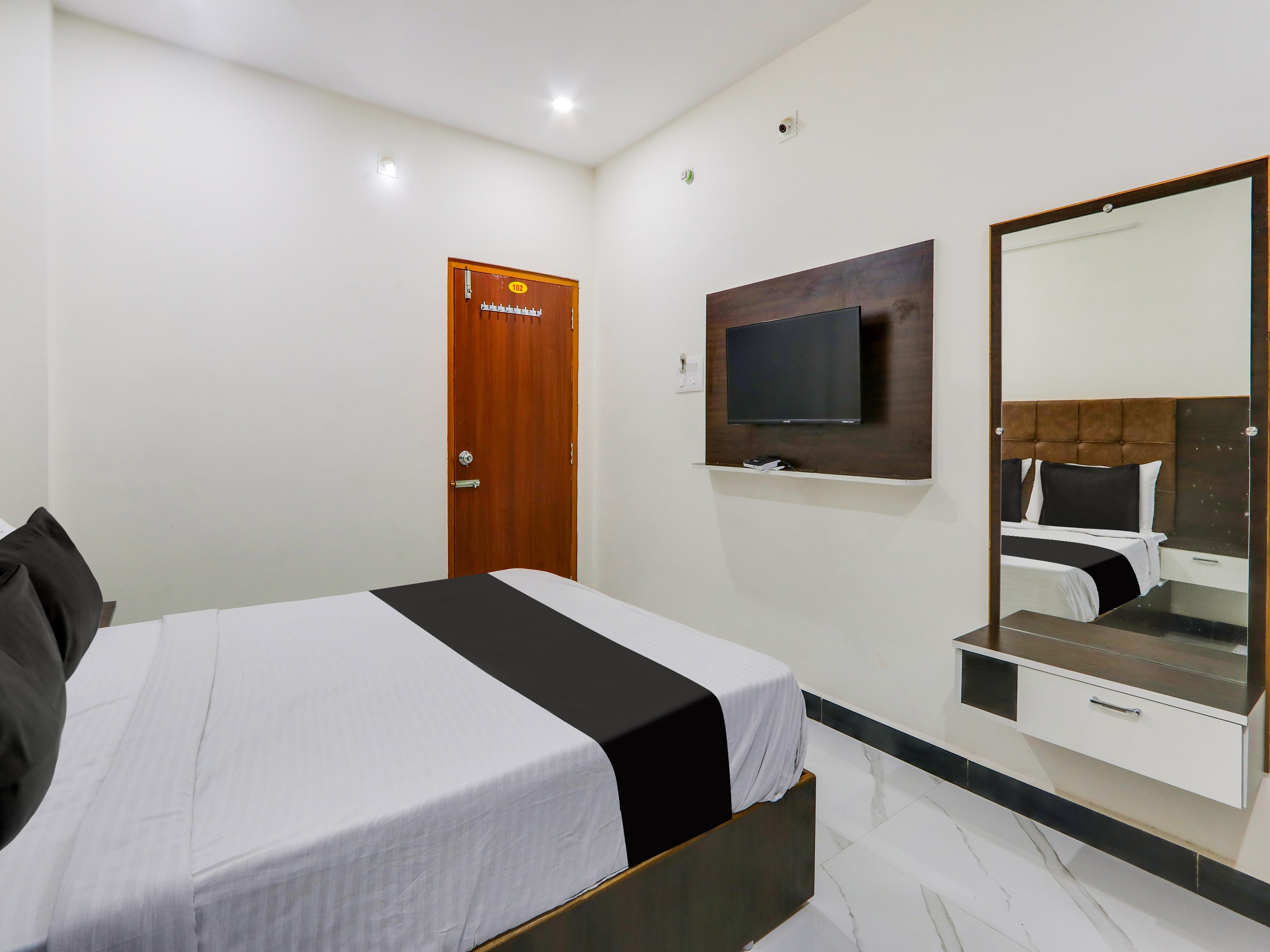 Hotel O Arjun Residency - Tap to explore photos