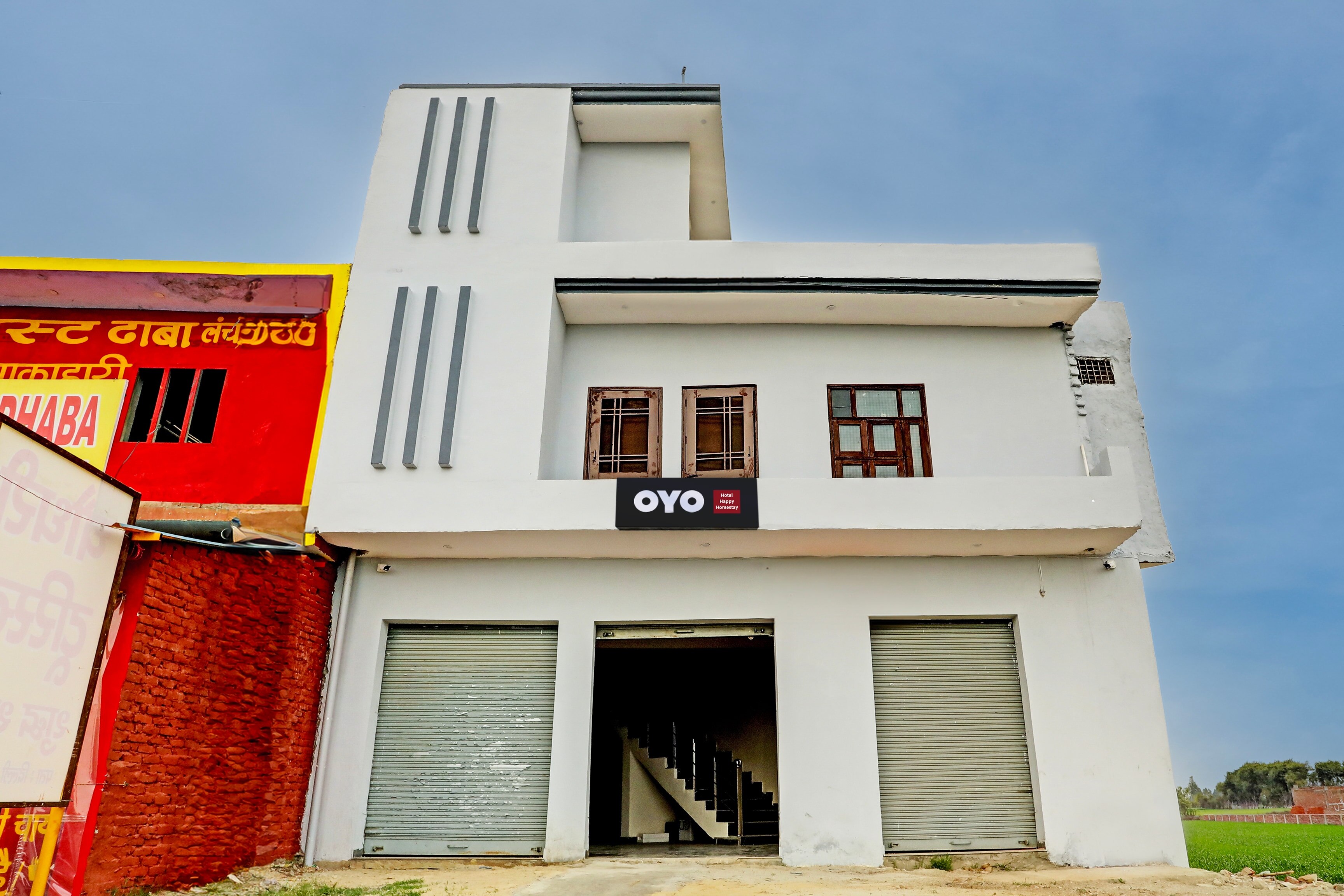 Hotel O The Happy Homestay - Tap to explore photos