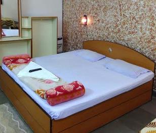 Hotel Mandakini - Tap to explore photos