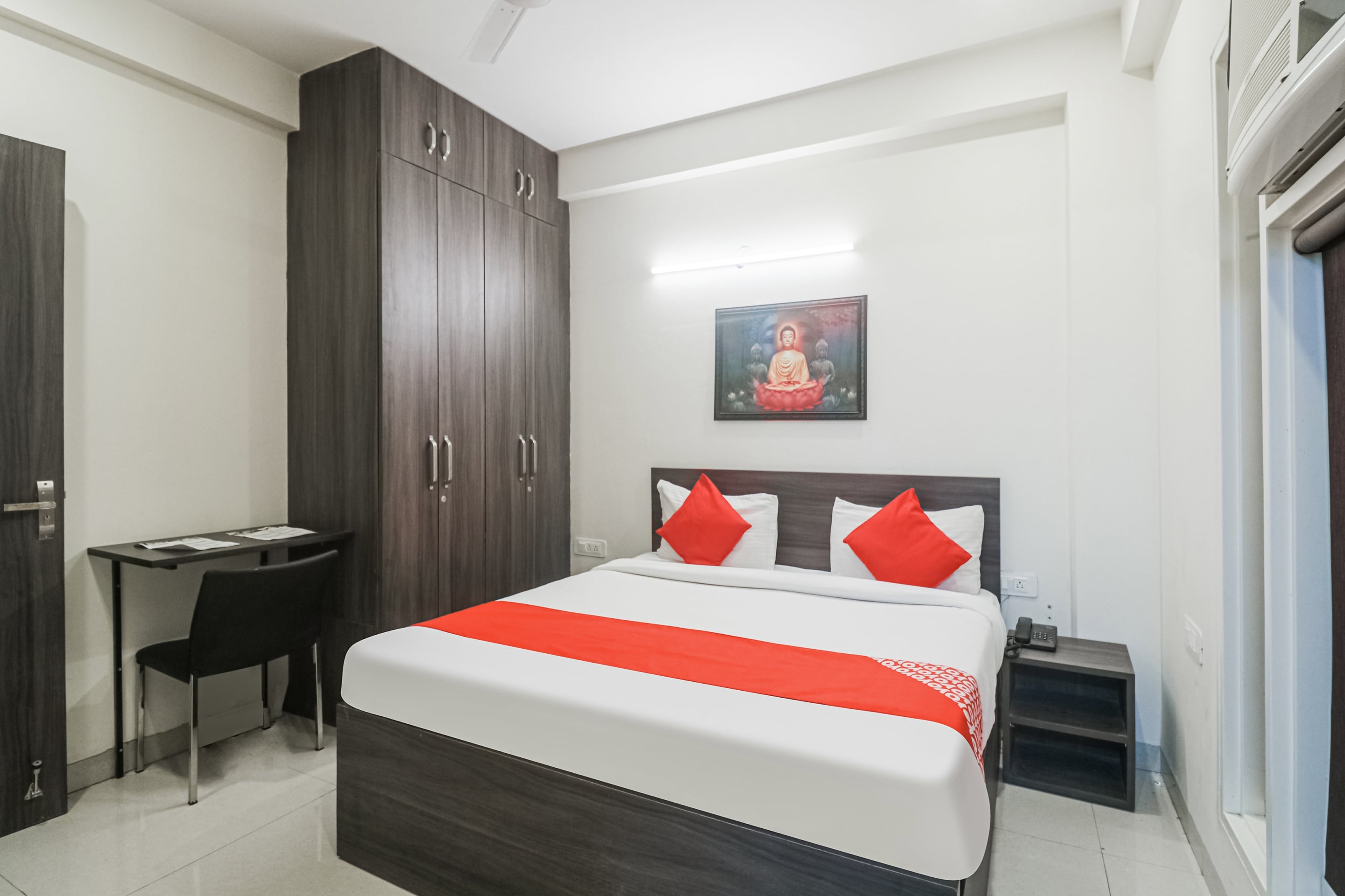 Hotel O Golf Inn Rooms - Tap to explore photos