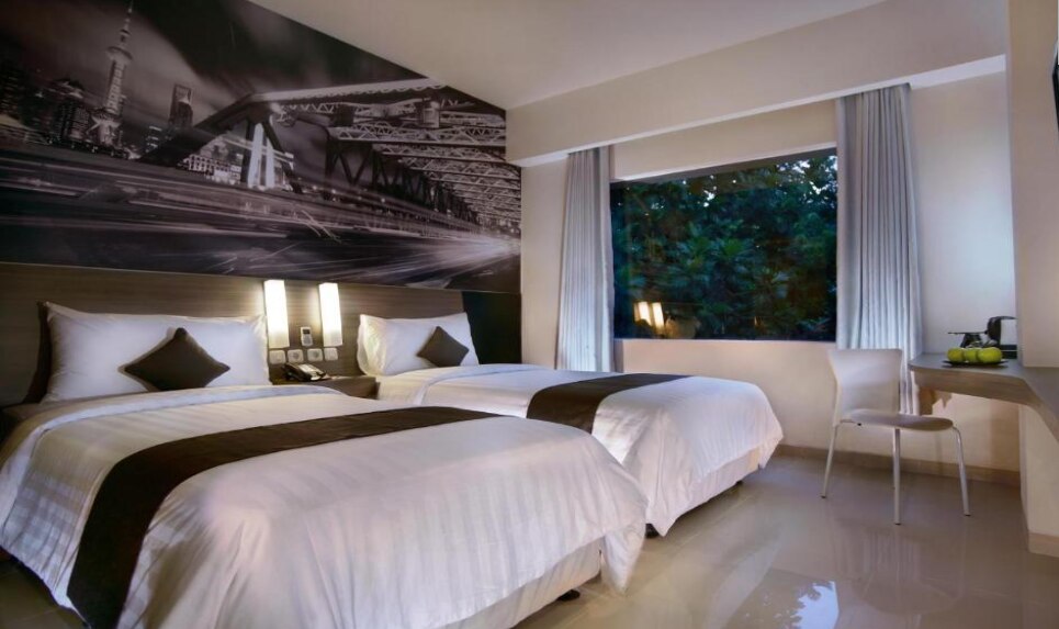 Hotel Neo Candi Simpang Lima - Tap to explore photos