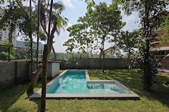 AKAM 30 yr Old Brick Villa Near Wonderla Kakkanad, Cochin