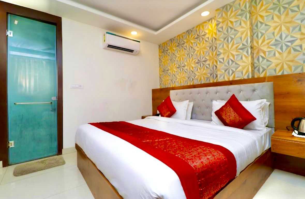 Hotel O AMBS SUITES - Tap to explore photos