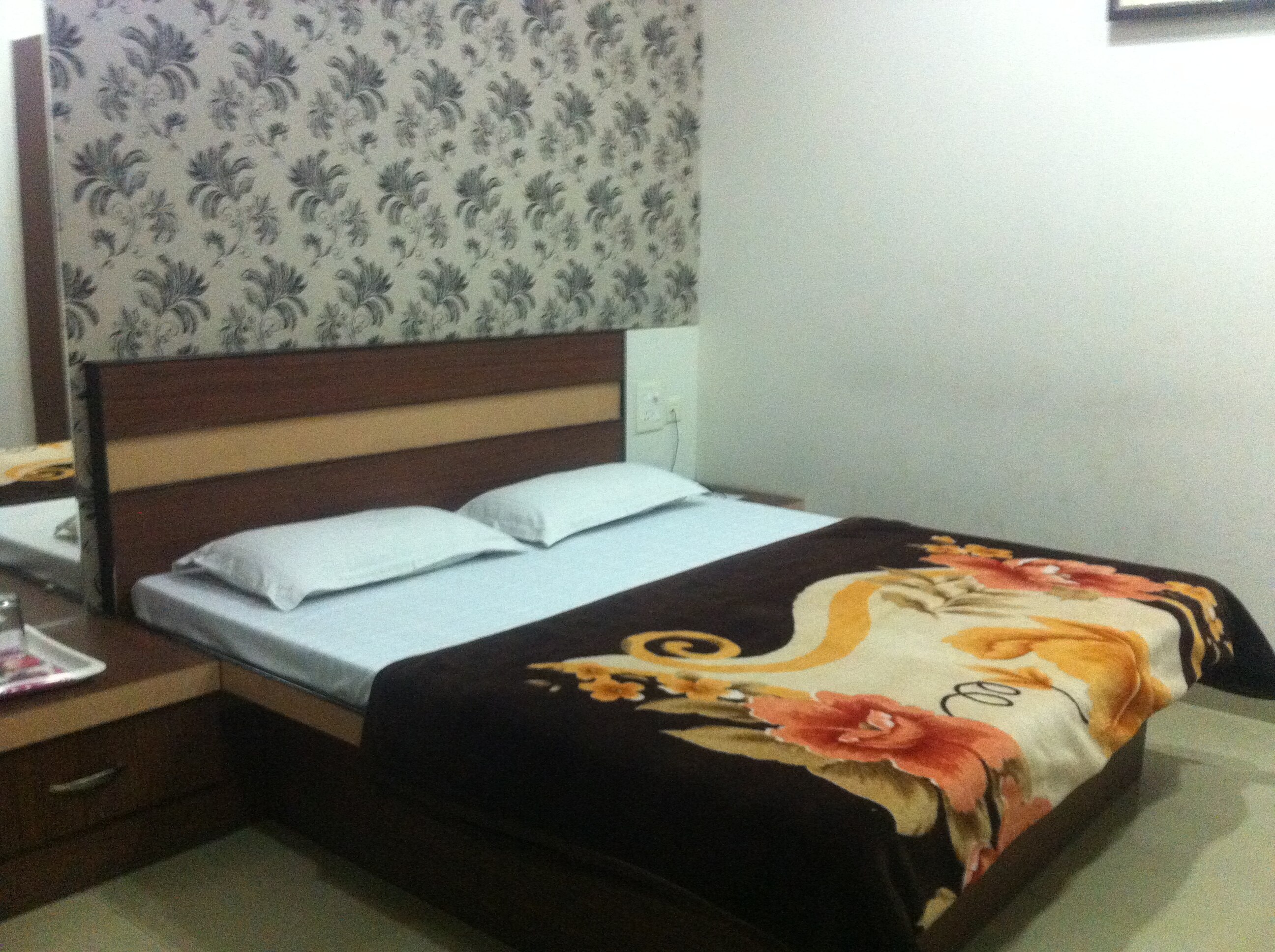 Hotel Tushar Residency - Tap to explore photos