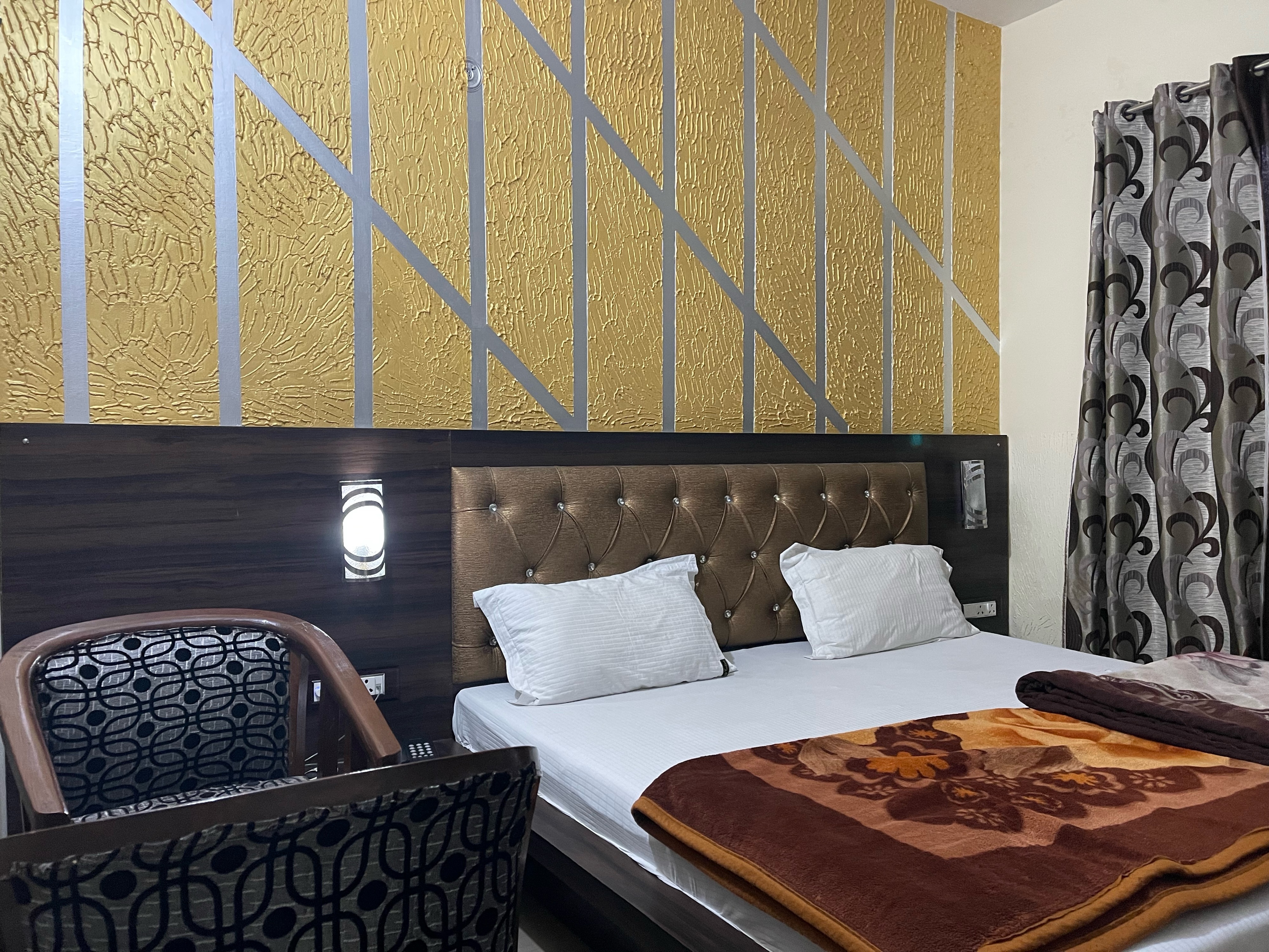 Trilok Hotel - Tap to explore photos