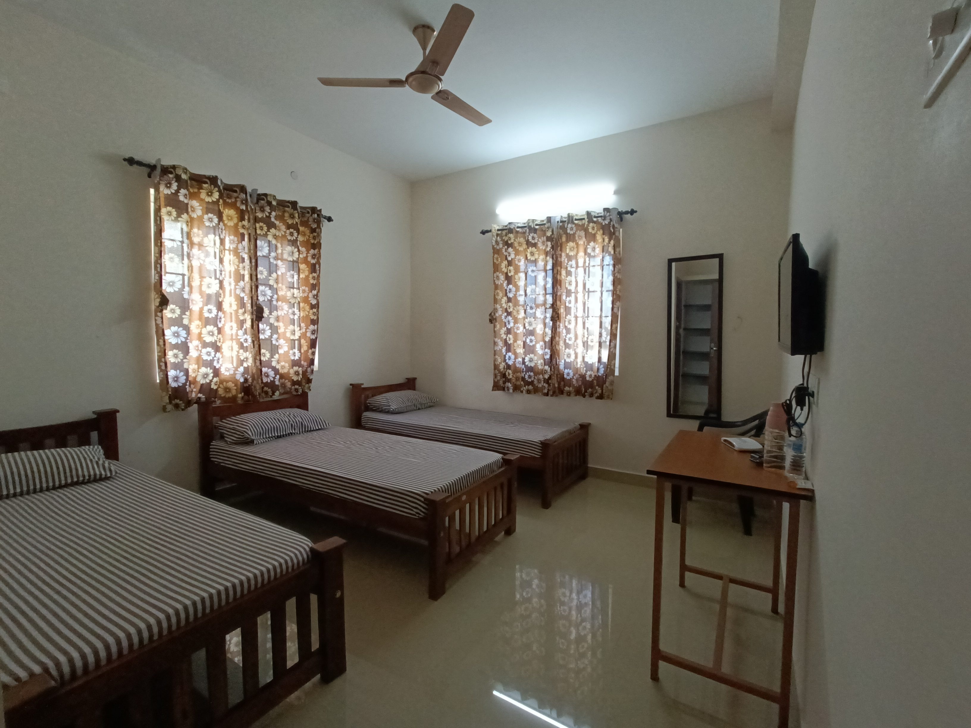 Shantham Service Apartments - Tap to explore photos