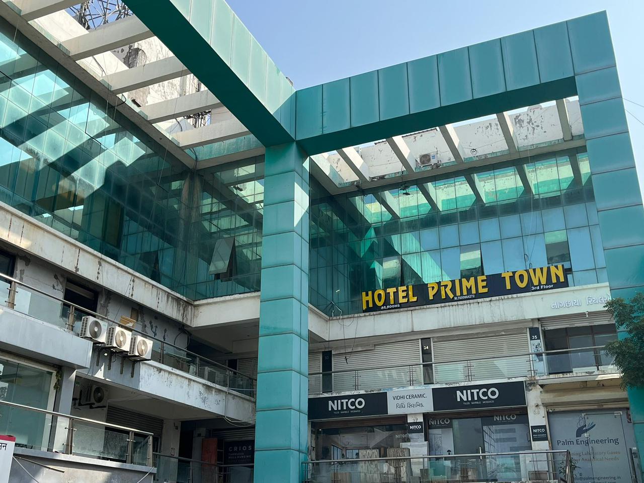 Hotel Prime Town - Tap to explore photos