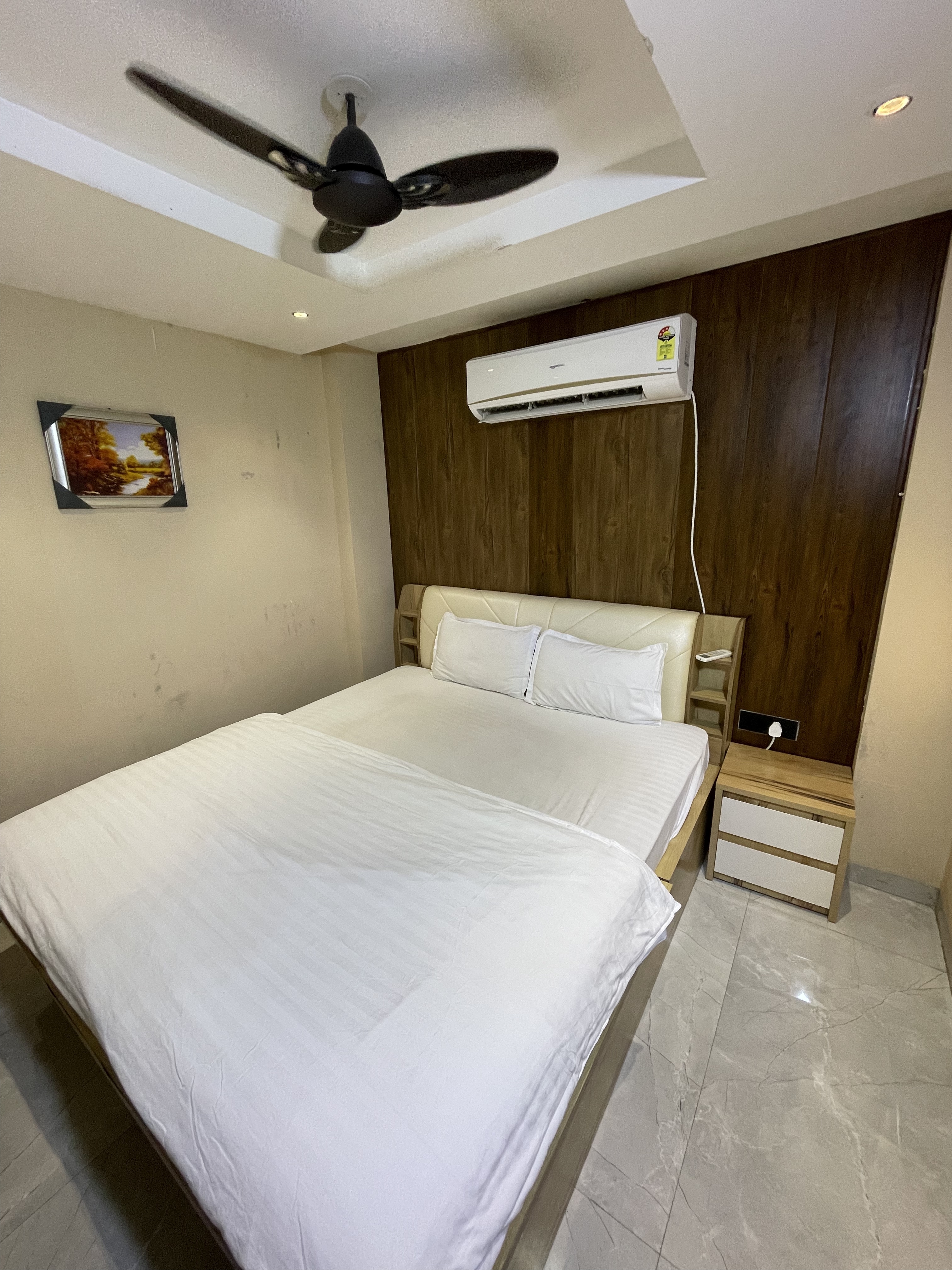 stayEZ Studio Apartments - Tap to explore photos