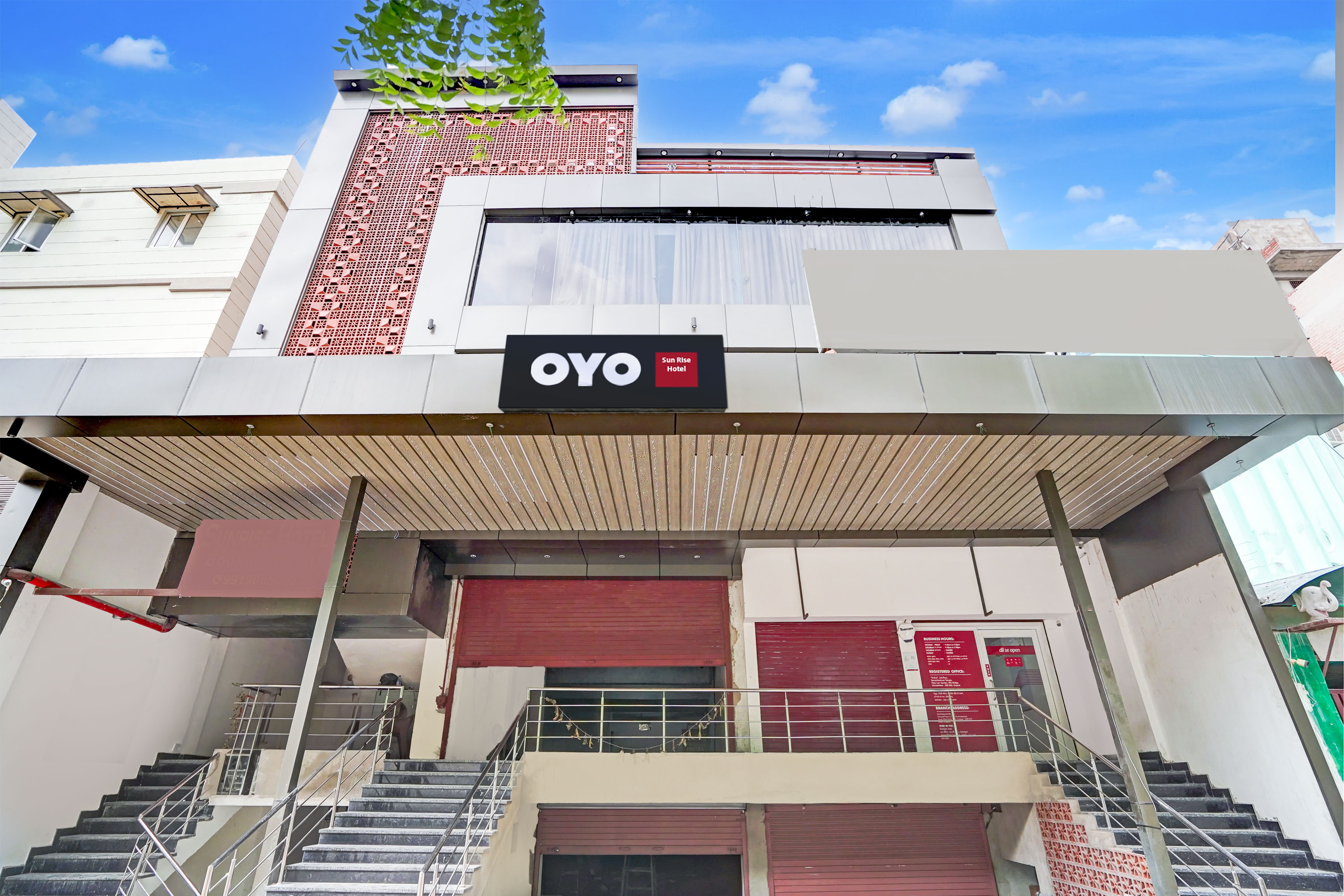 OYO 828833 Sun Rise Hotel - Tap to explore photos