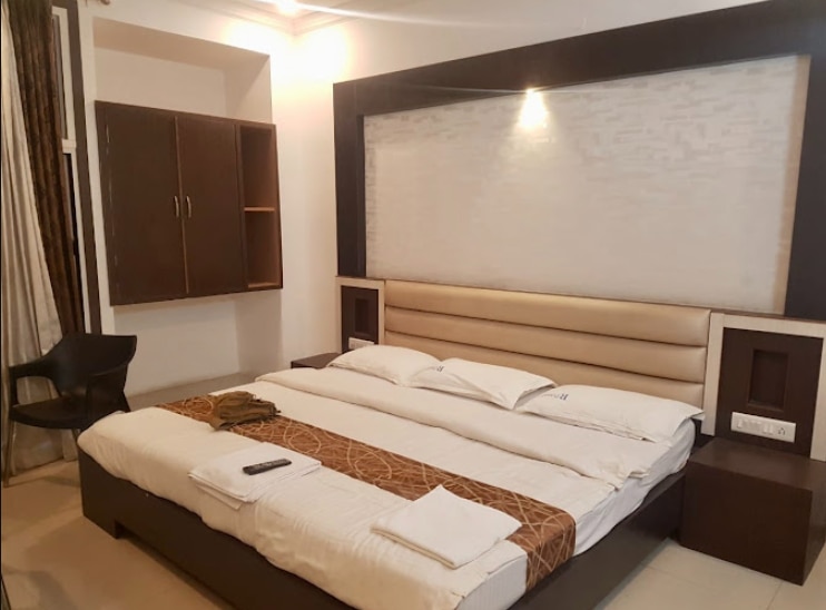 Hotel Shivananda - Tap to explore photos