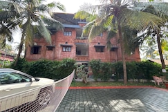 Malgudi Holidays Apartment | Rooms & Kitchen, Kannur