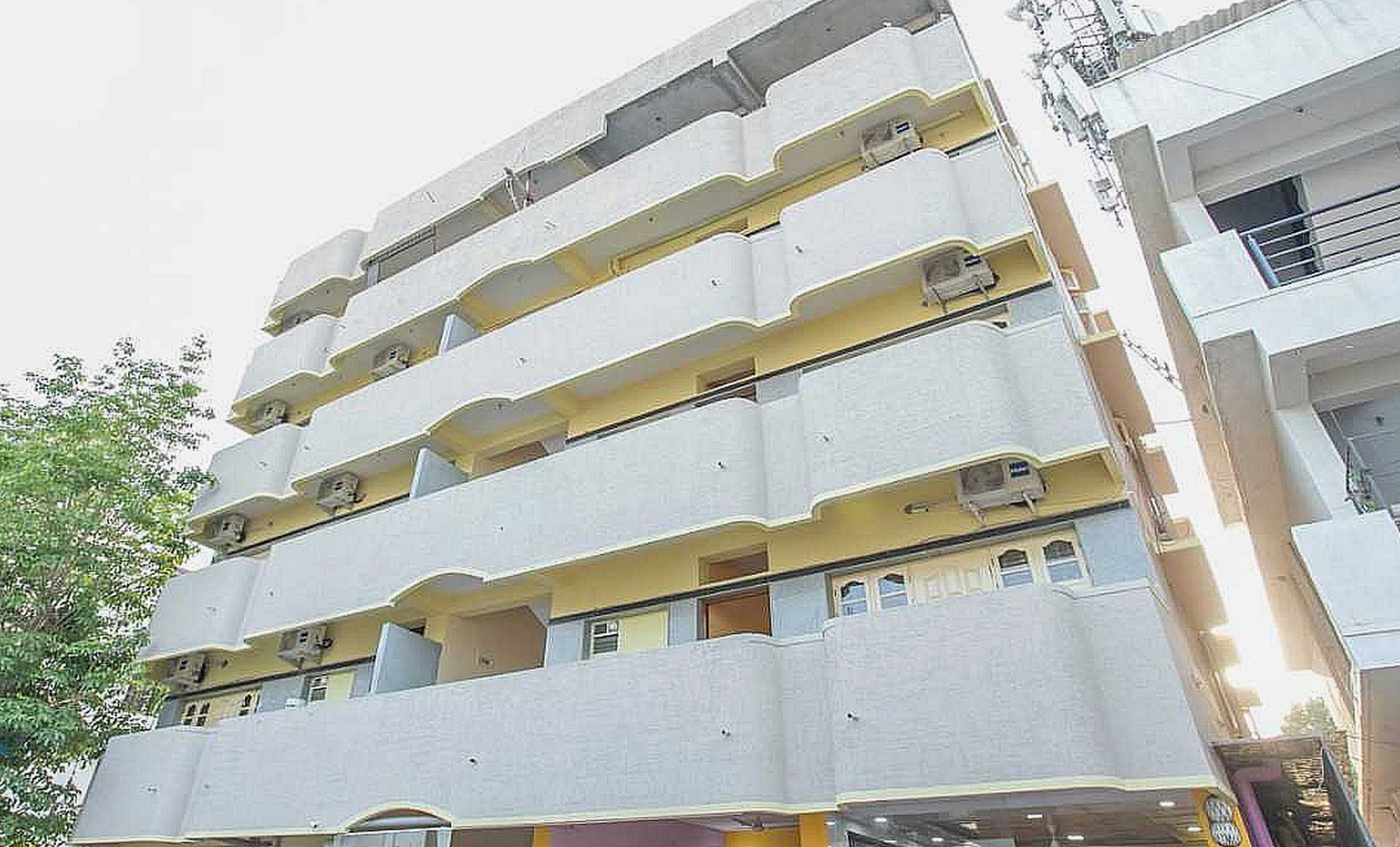 Hotel O Blossom Suites - Tap to explore photos