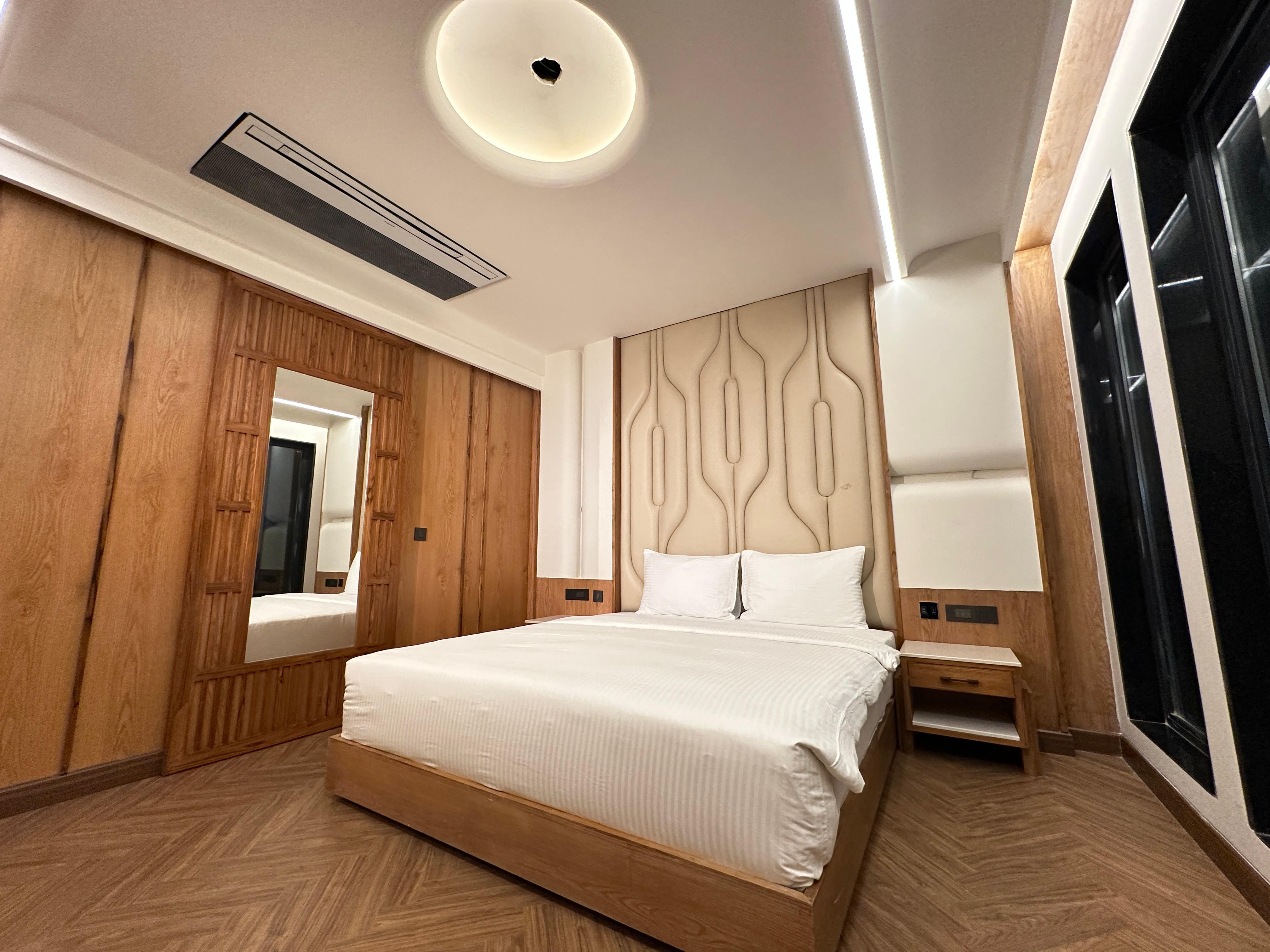 Elixys Suites - Tap to explore photos