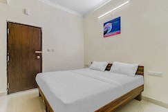 Capital O Safari Rooms Near Snow City, Bangalore
