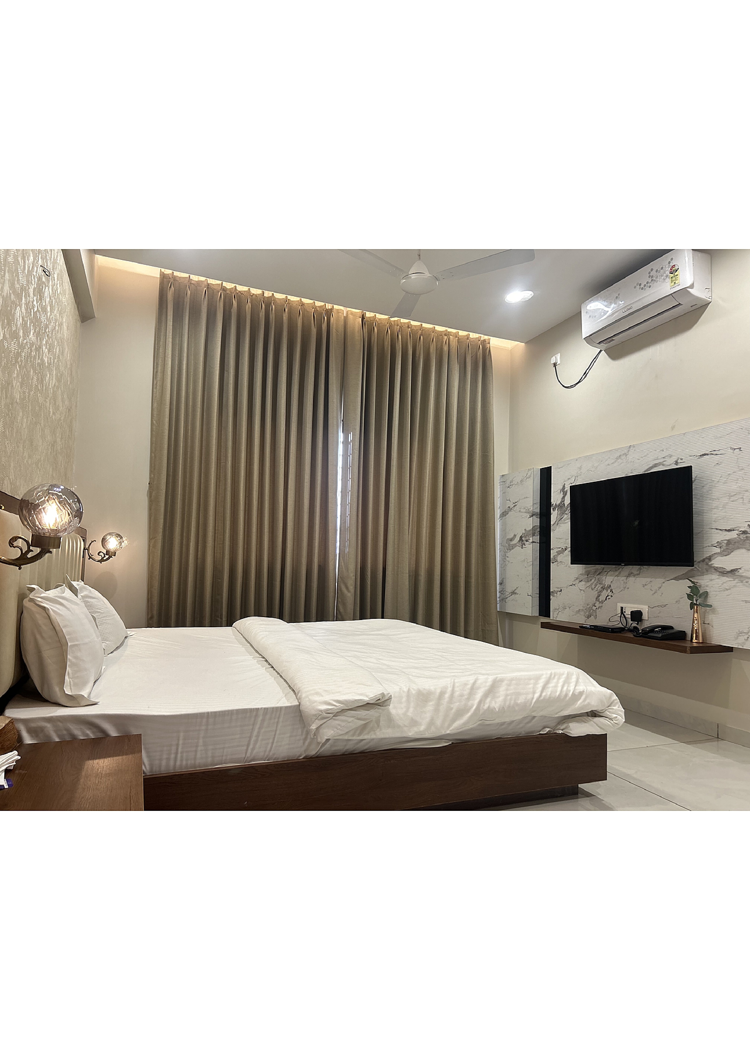 Hotel Yashraj Executive - Tap to explore photos