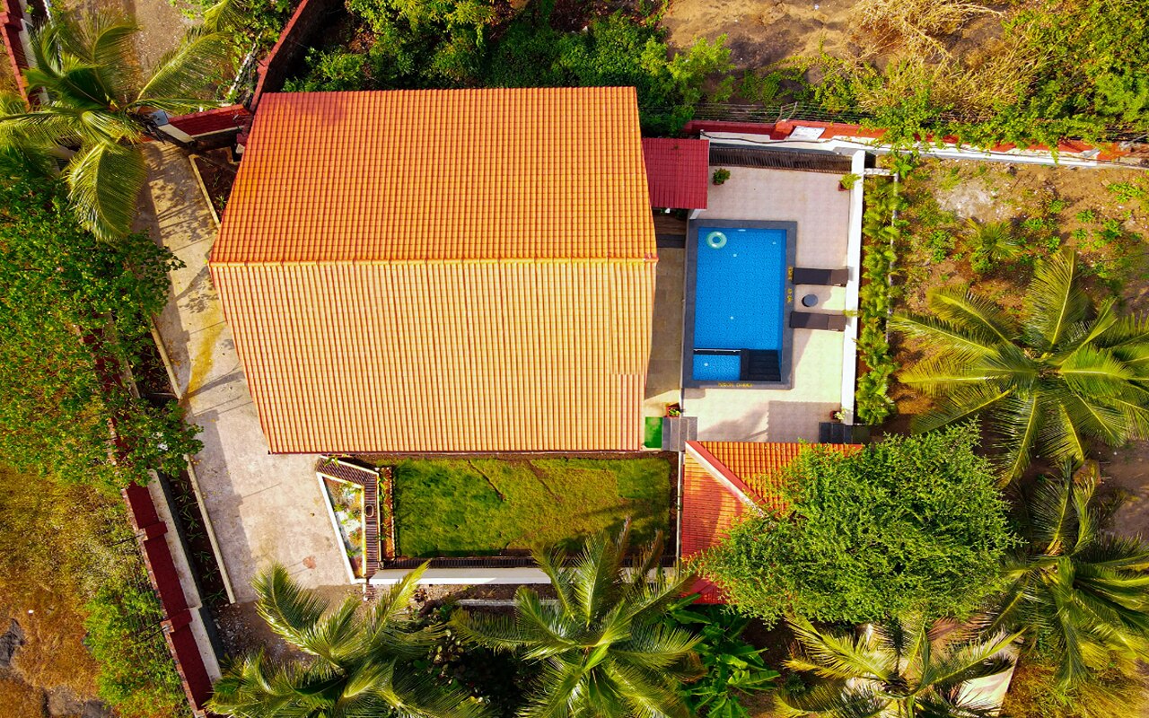 SaffronStays Coral By The Beach Roomwise - Tap to explore photos