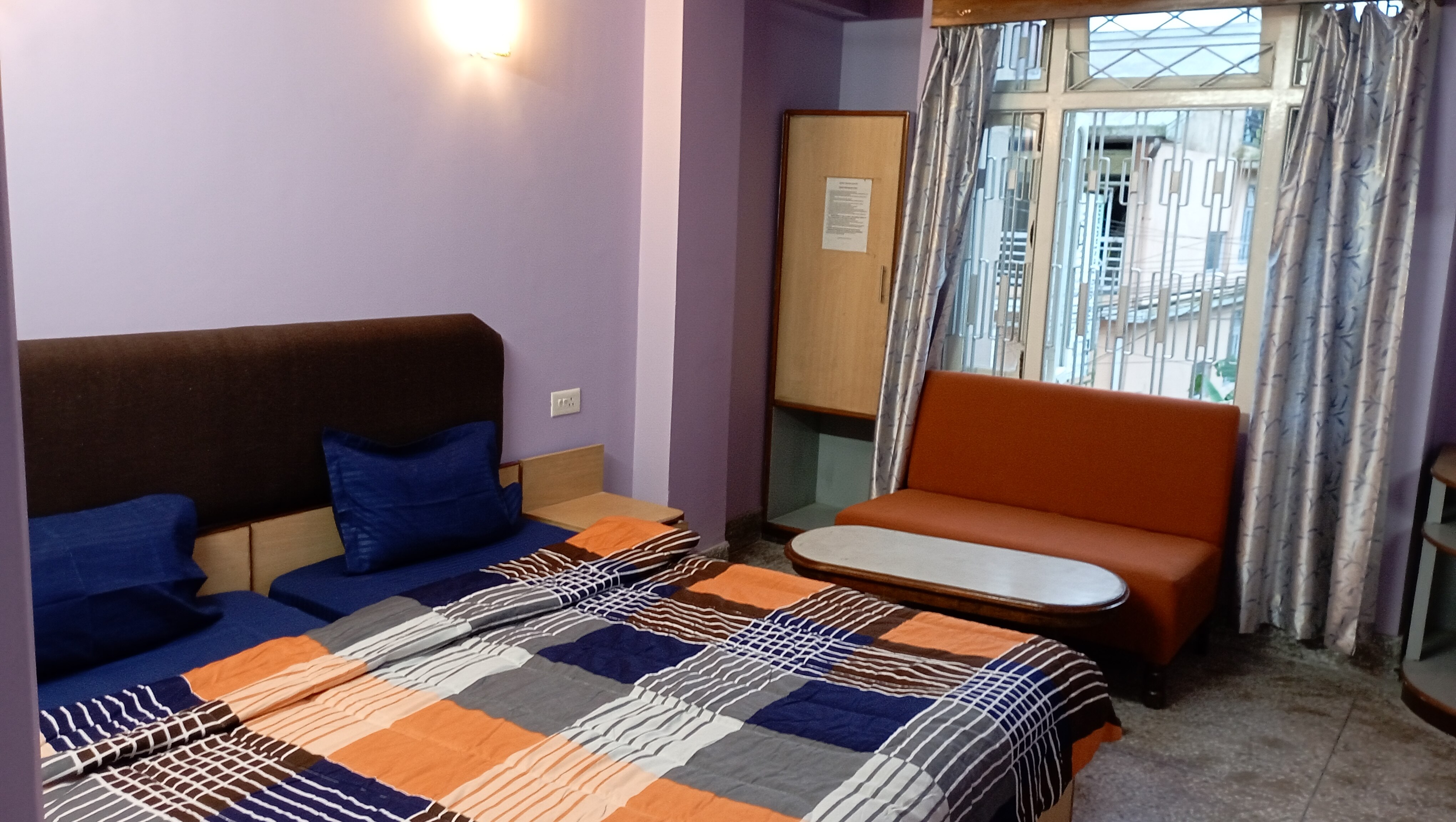 Hotel Travellers Inn - Tap to explore photos