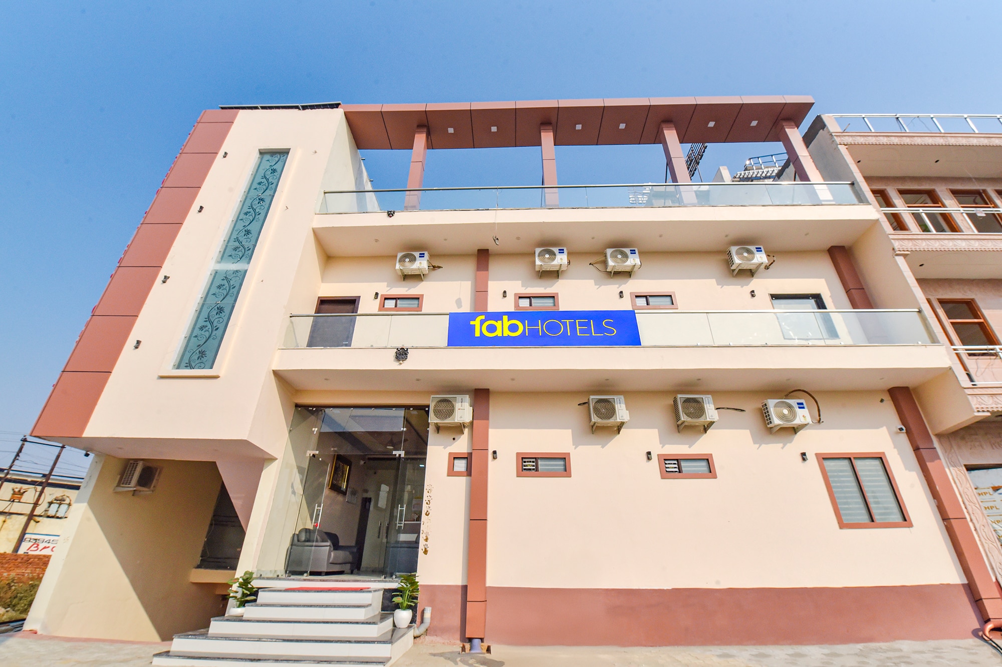 FabHotel Shri RK Residency - Nr. Pram Mandir / Shree Banke Bihari Temple - Tap to explore photos